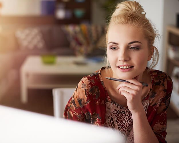 Young creative woman working at home Young creative woman working at home